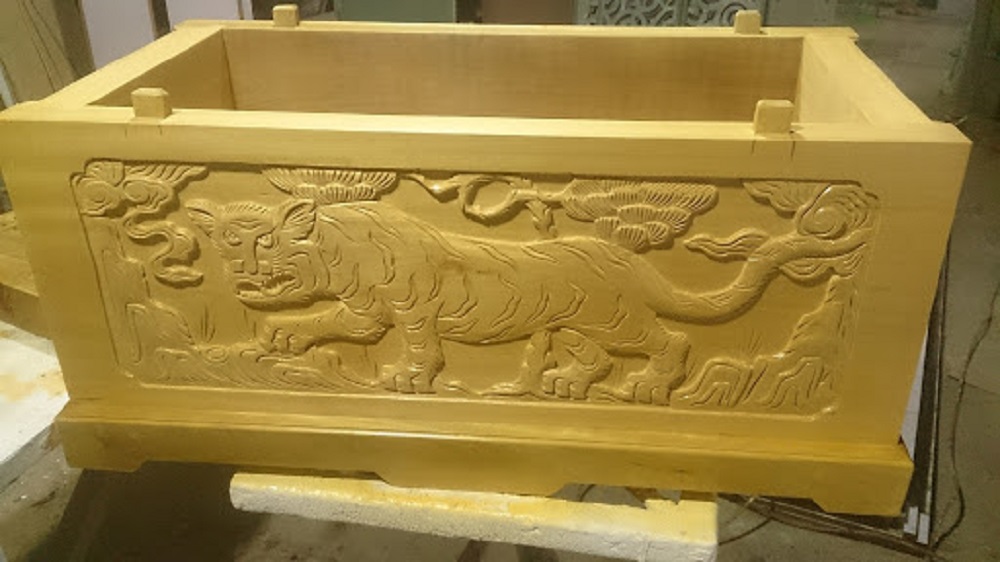 Quách gỗ vàng tâm